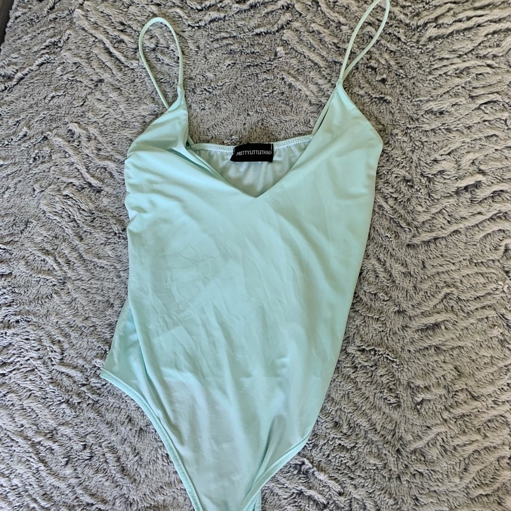 Teal low cut bodysuit never worn